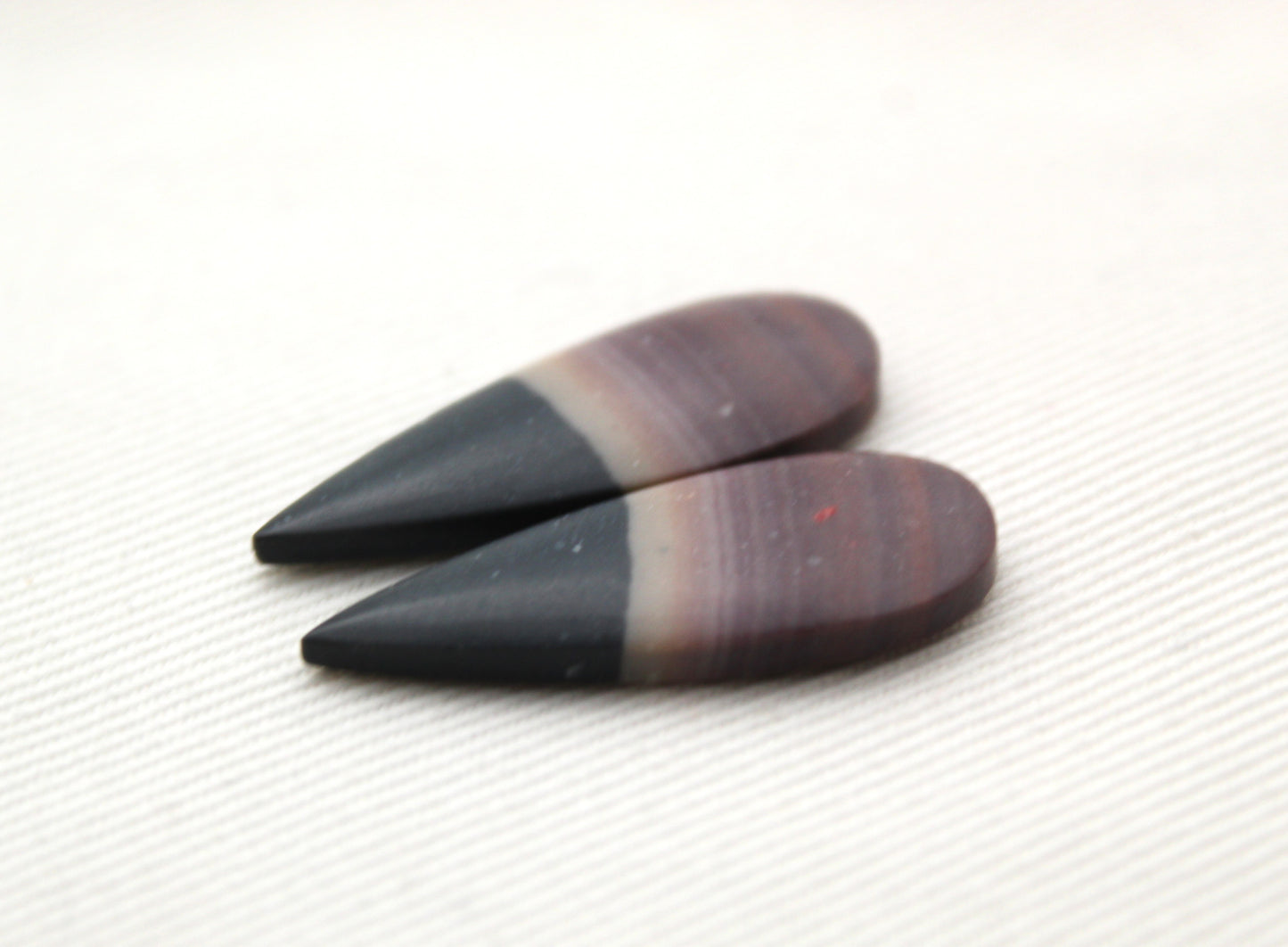 Matching pair of Indonesian Polychrome Jasper Cabochons
