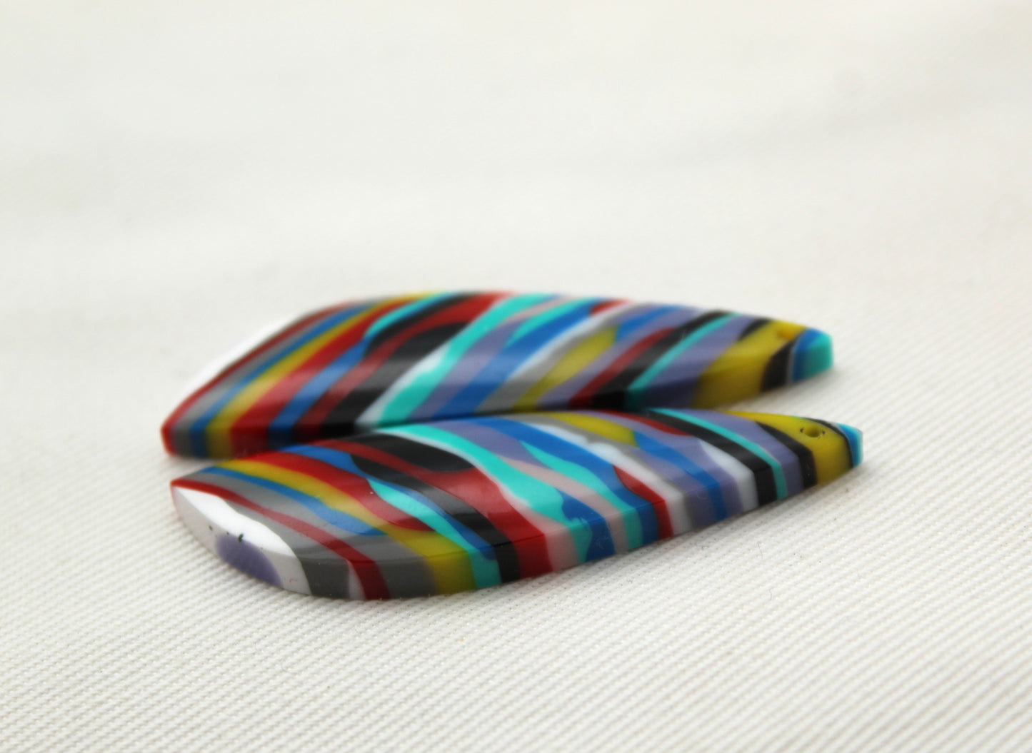 Surfite Cabochon Pair multicolors long DRILLED