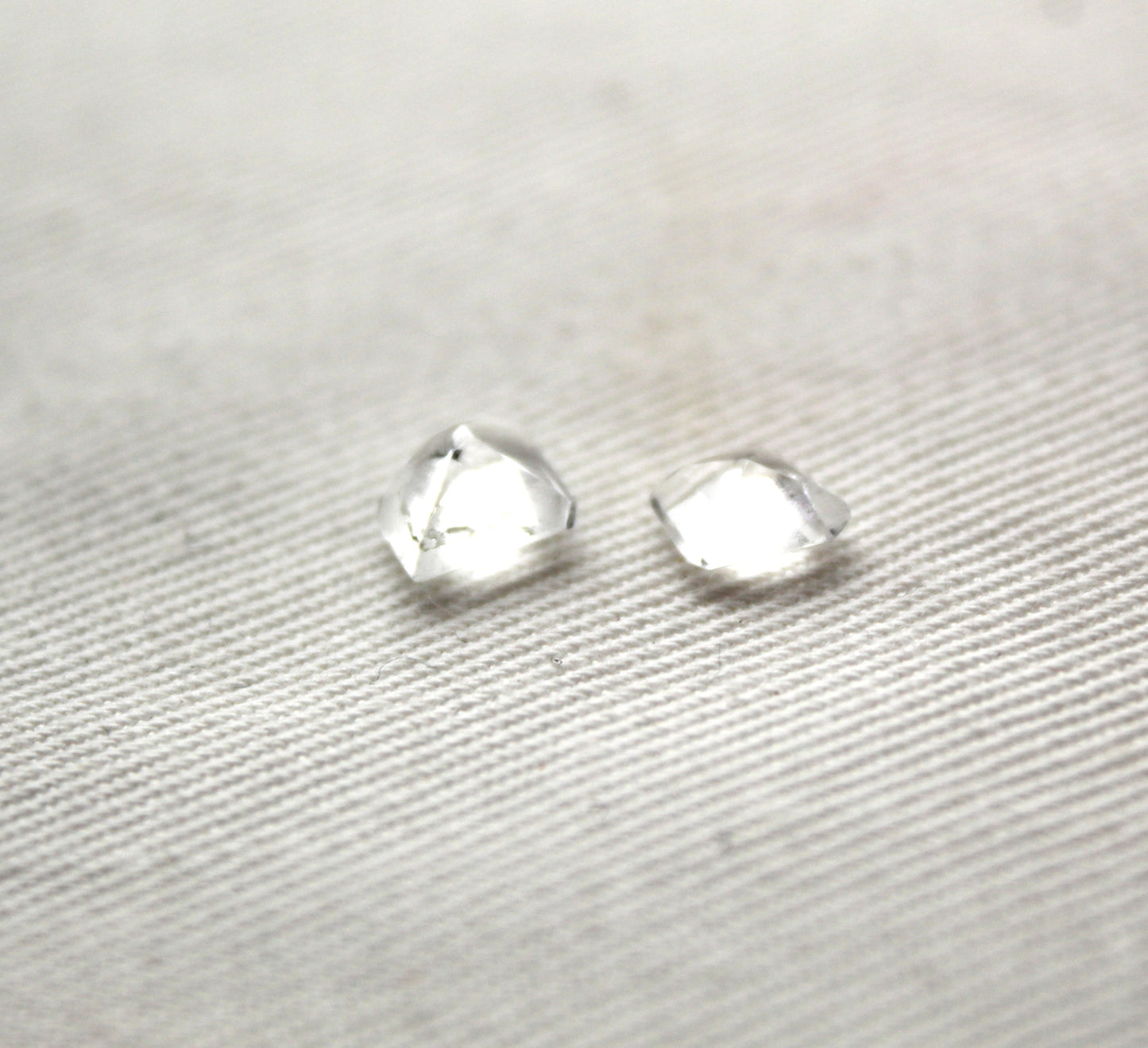 TWO Faceted Hollandite in Quartz freeform Gemstone clear