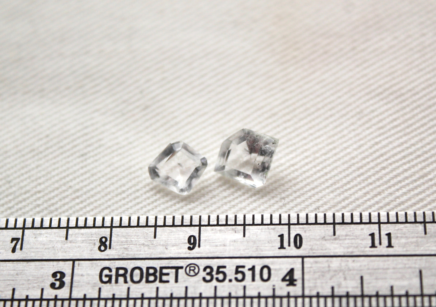 TWO Faceted Hollandite in Quartz freeform Gemstone clear