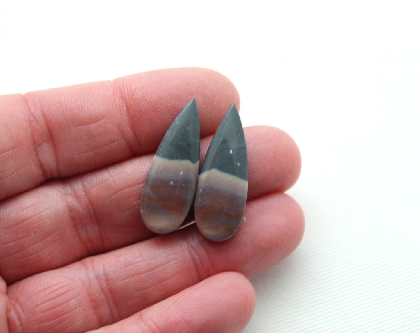 Matching pair of Indonesian Polychrome Jasper Cabochons