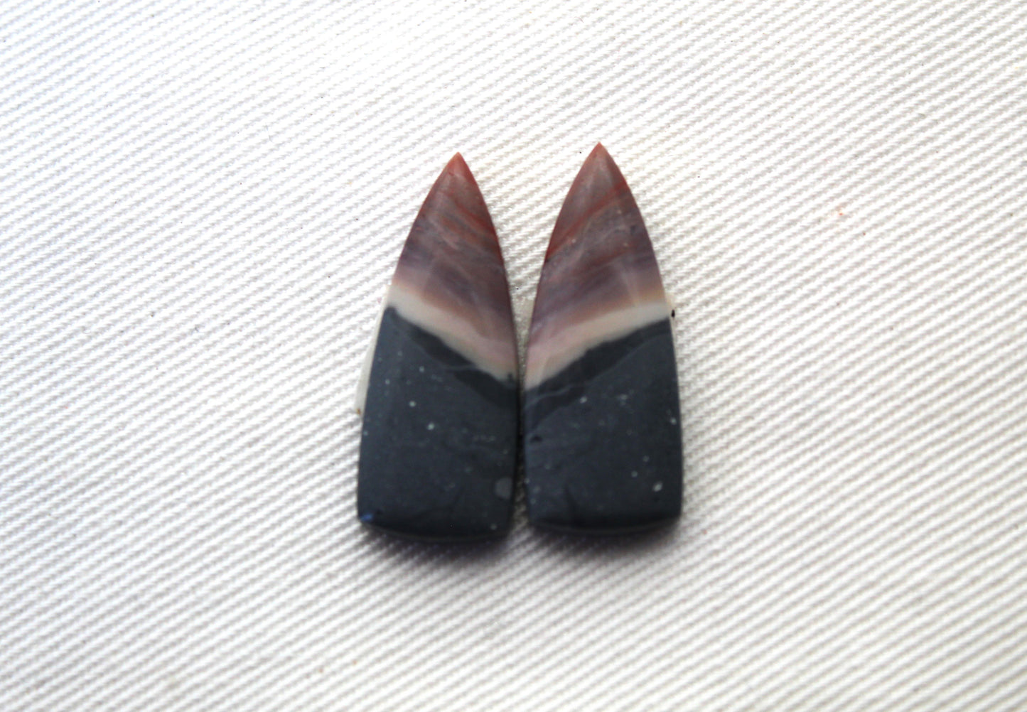 Small pair of Indonesian Polychrome Jasper Cabochons