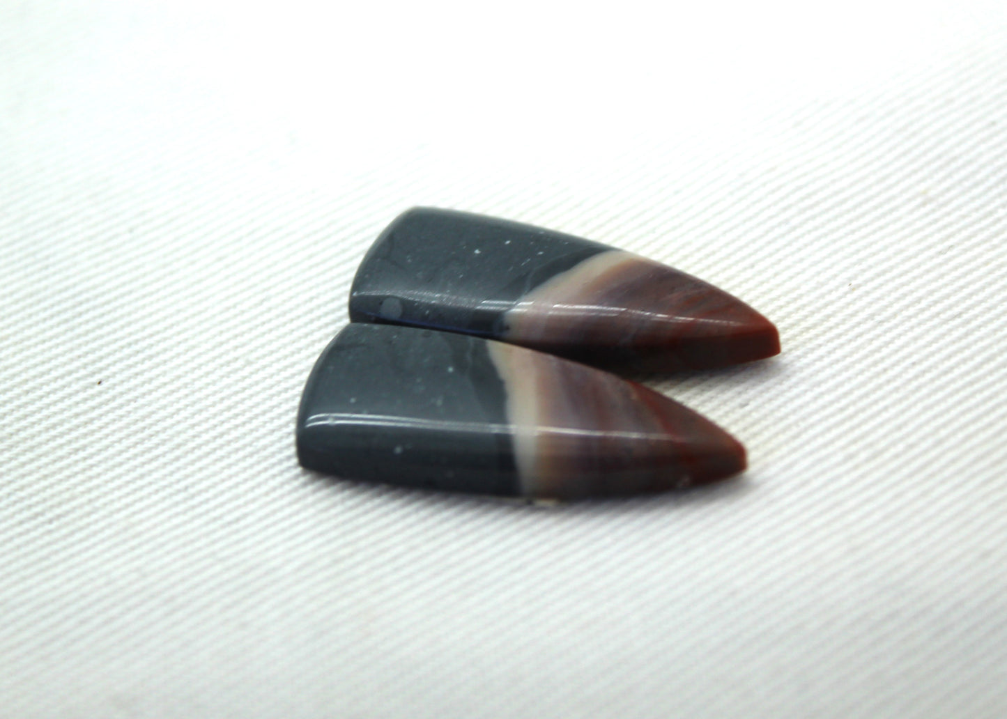 Small pair of Indonesian Polychrome Jasper Cabochons