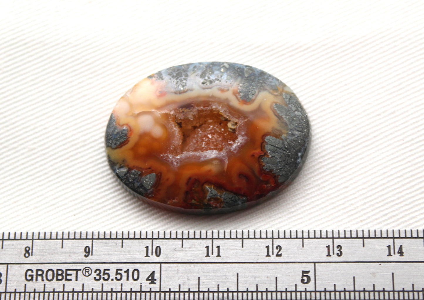 Marcasite in Agate Cabochon Gemstone orange with Druzy Oval