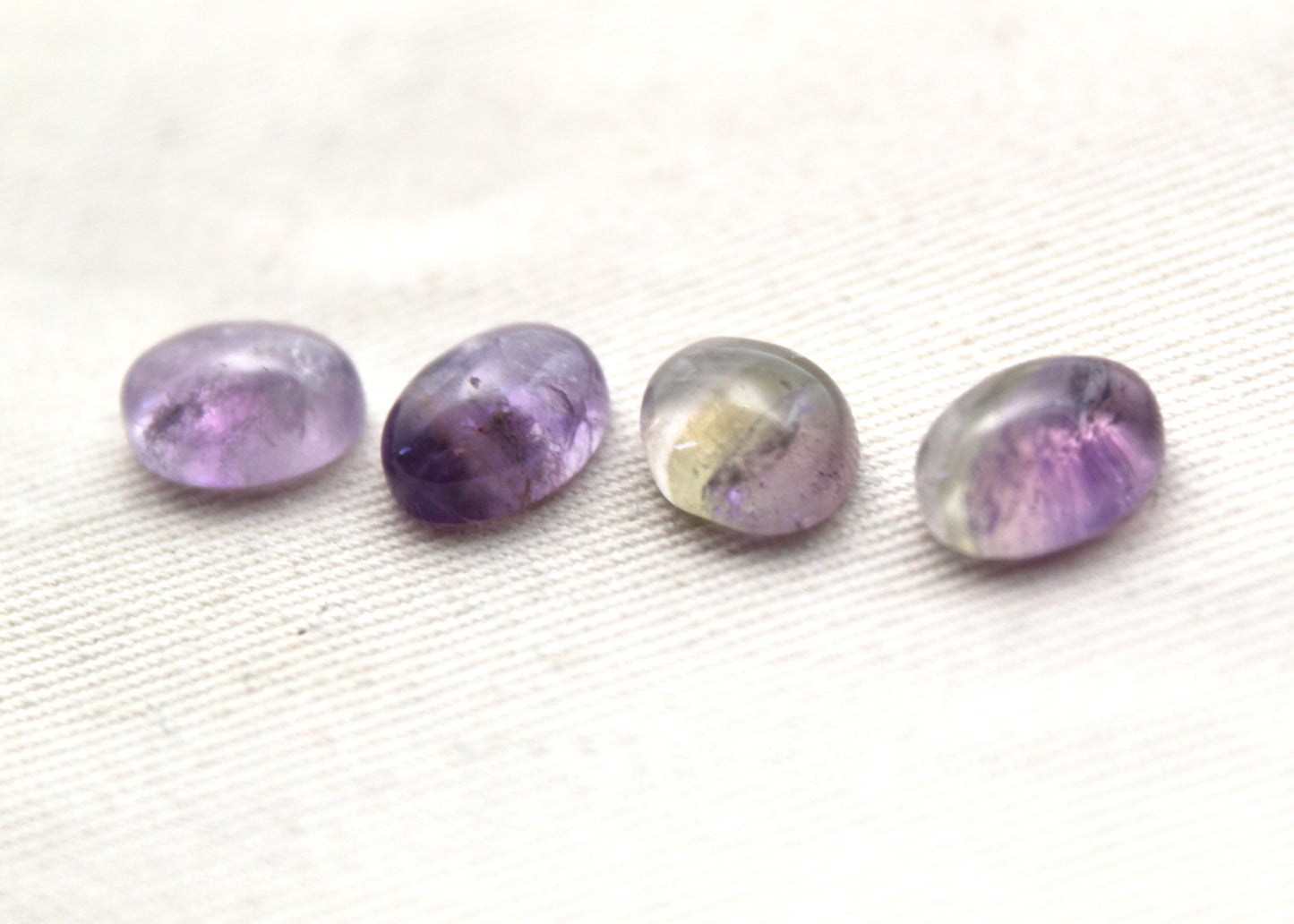 FOUR amethyst Chevron oval cabochons 8X10MM