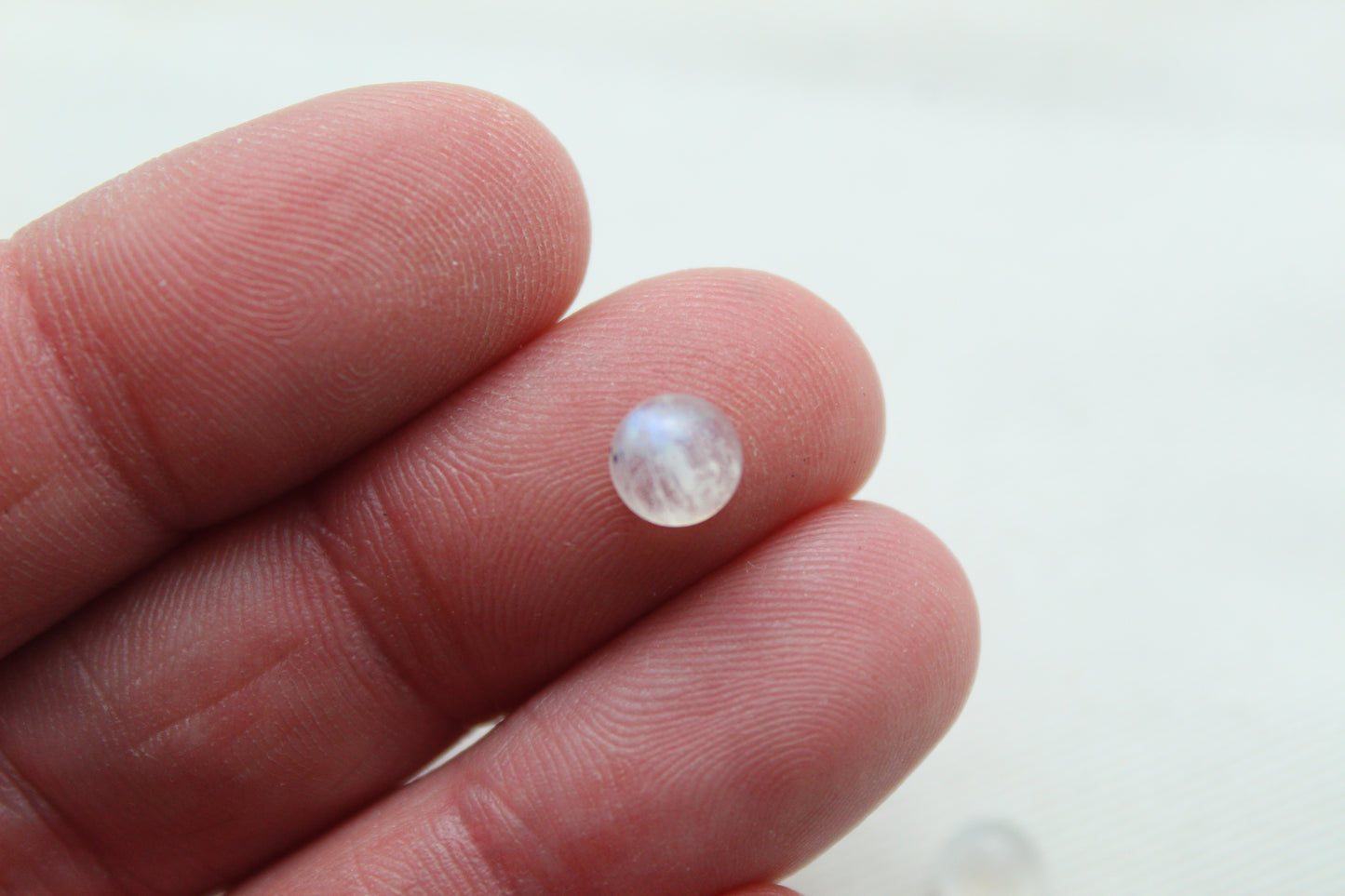 <tc>Deux cabochons de Pierre de Lune ovale 12X10MM</tc>