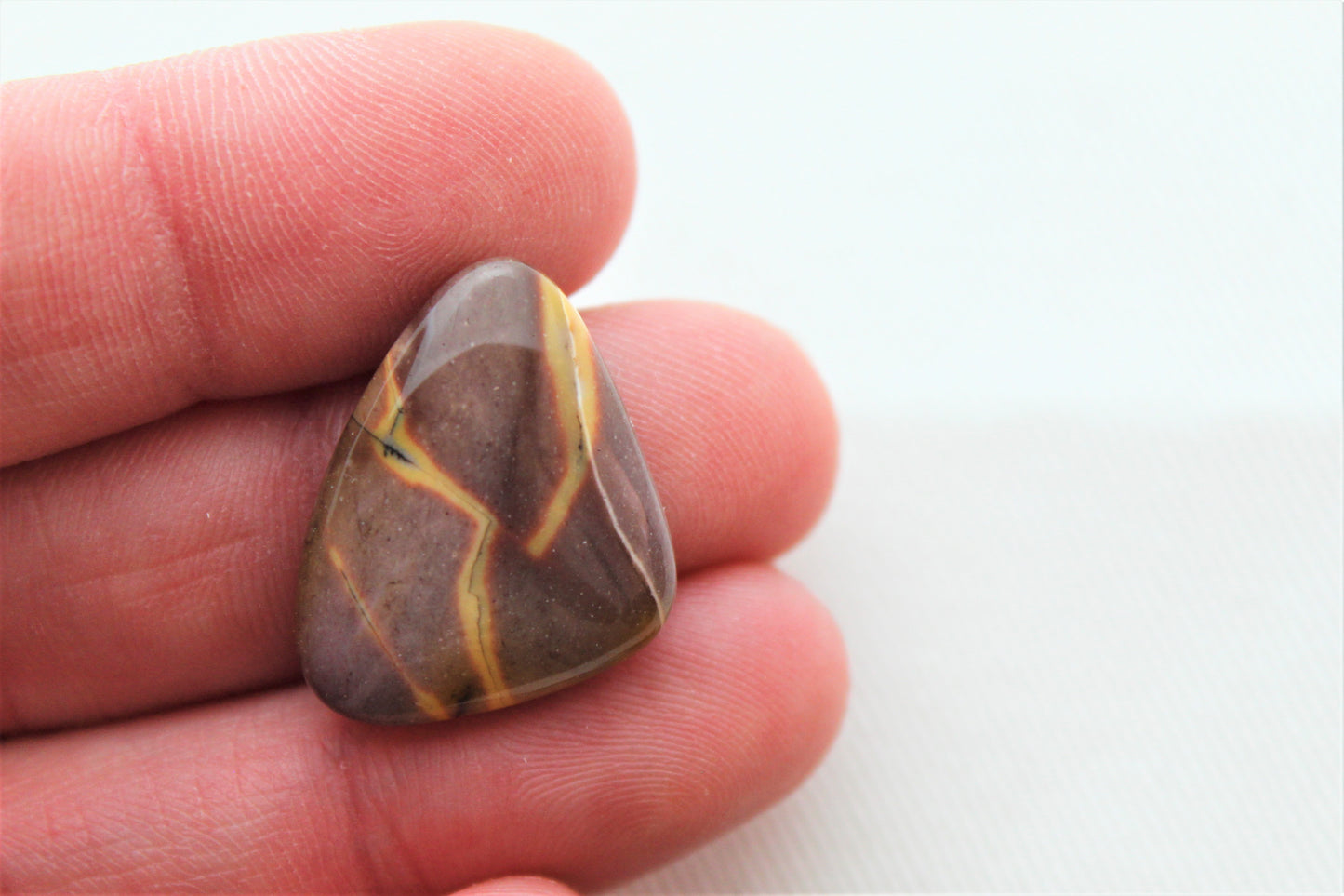 Lot of three mookaite cabochons freeform Gemstones purple