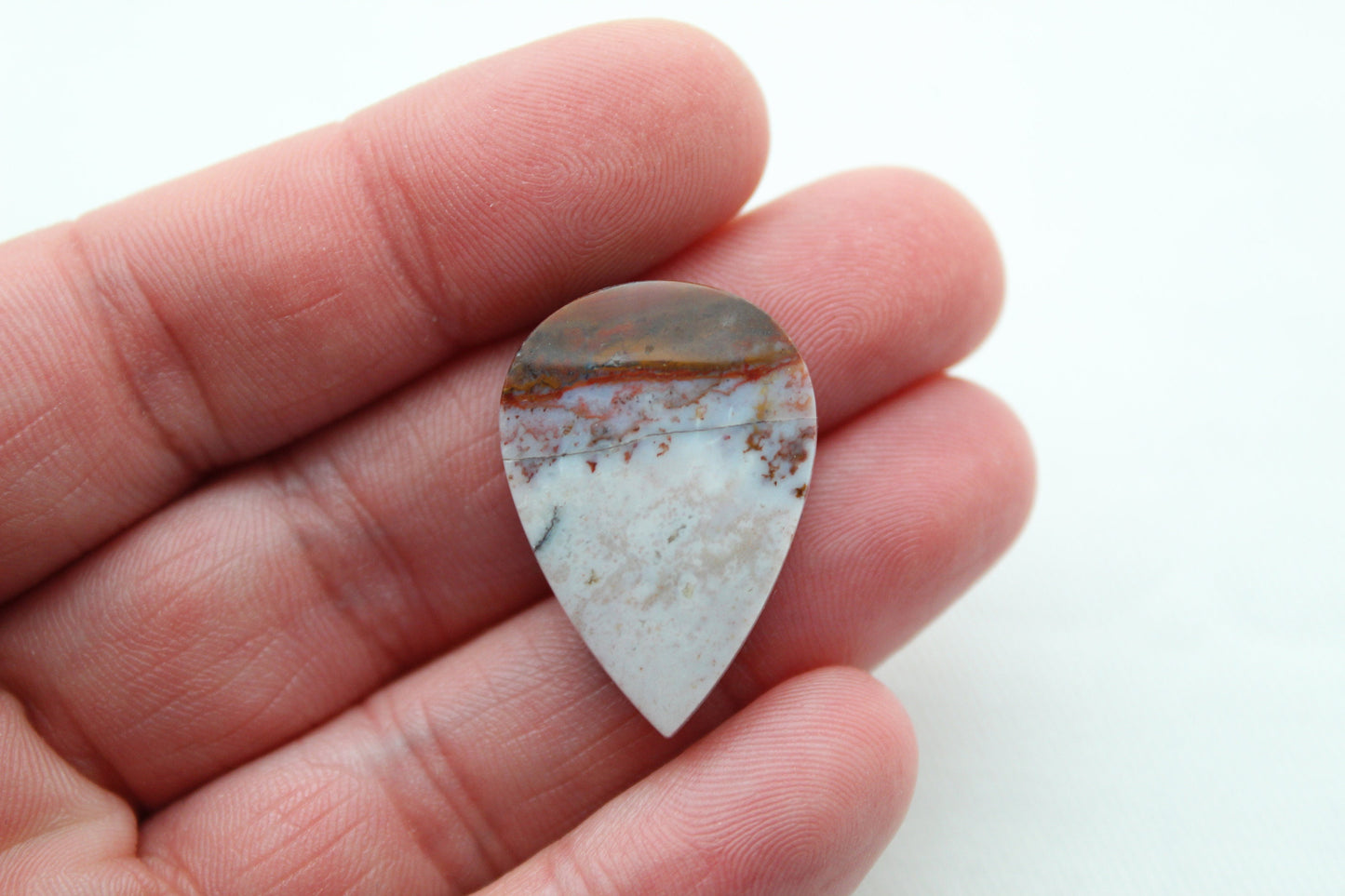 One Opalized Wood Copper Cabochon pear gemstone