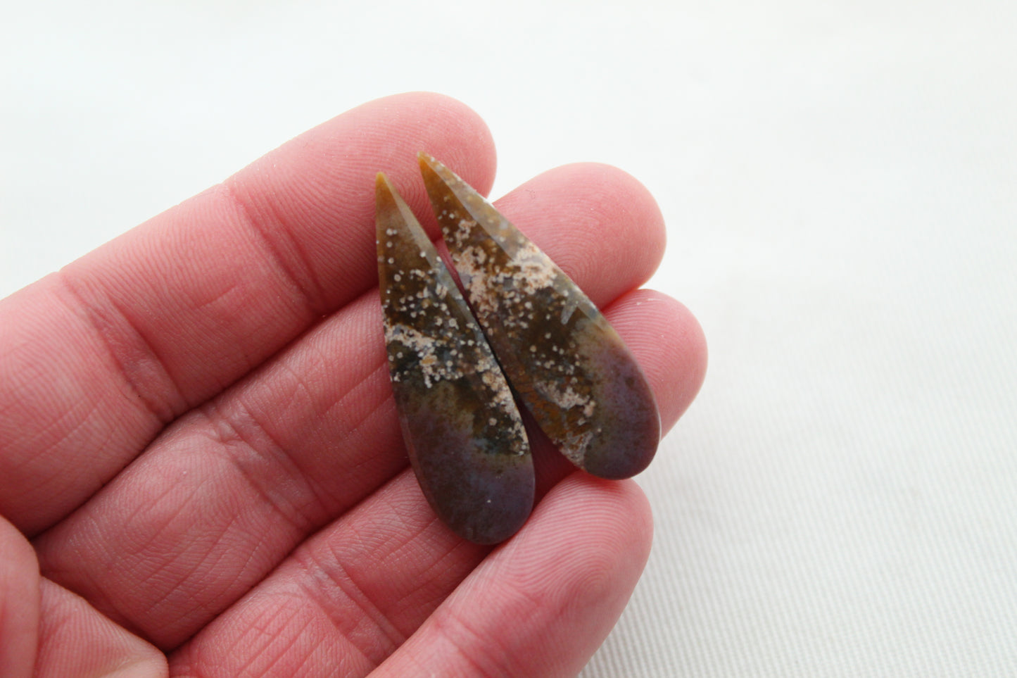 Pair of Petrified Wood Cisero Cabochons purple