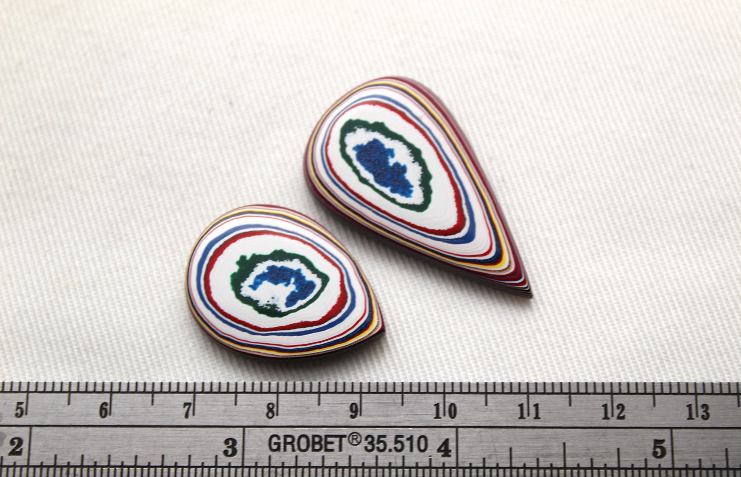 TWO Fordite Cabochon white red blue