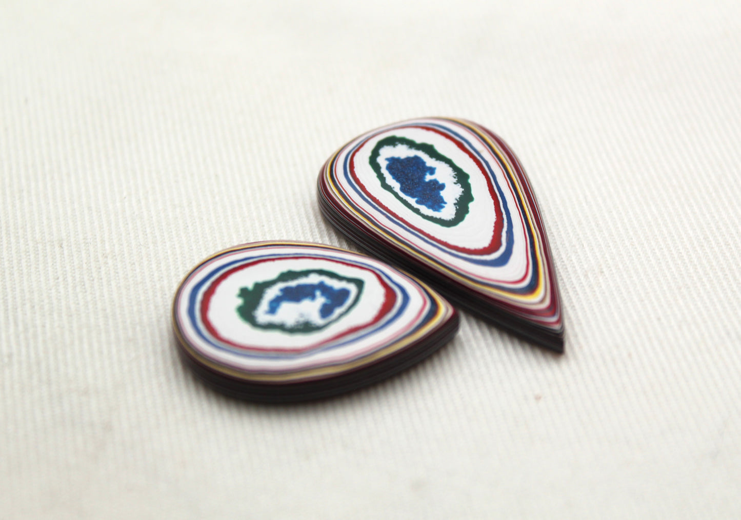 TWO Fordite Cabochon white red blue