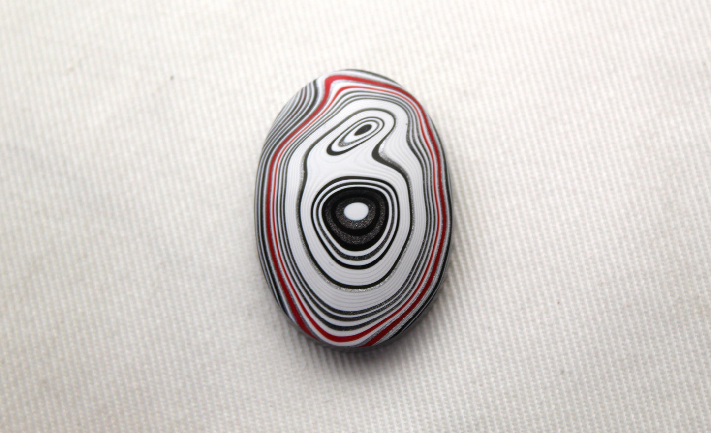 Fordite Cabochon oval white green black