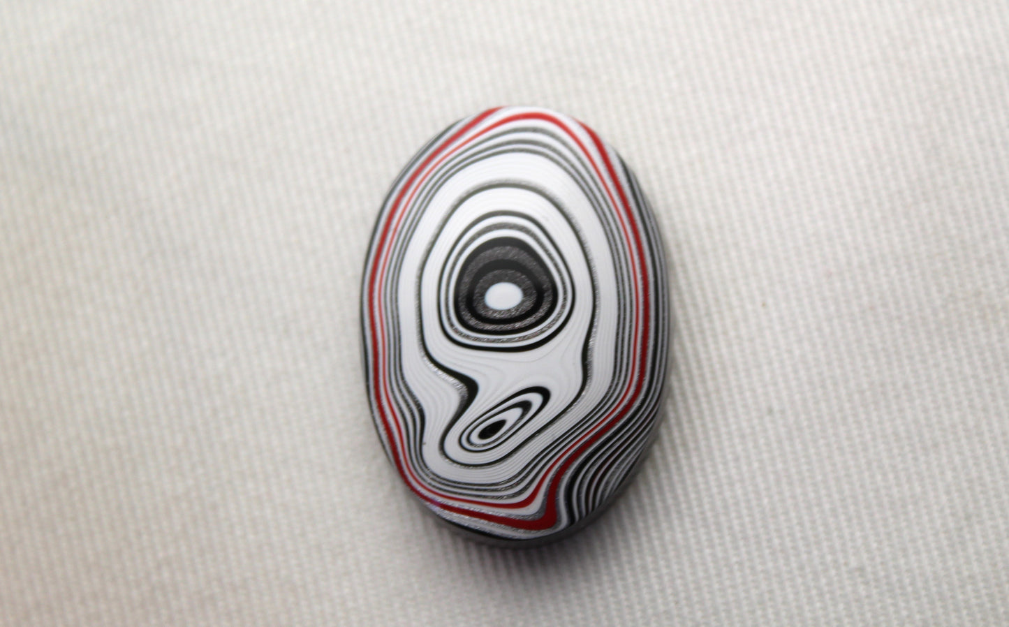 Fordite Cabochon oval white green black