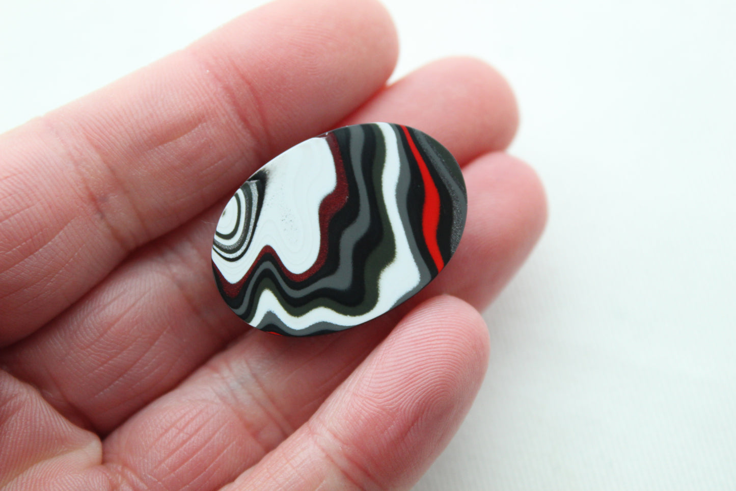 Fordite Cabochon oval white green black