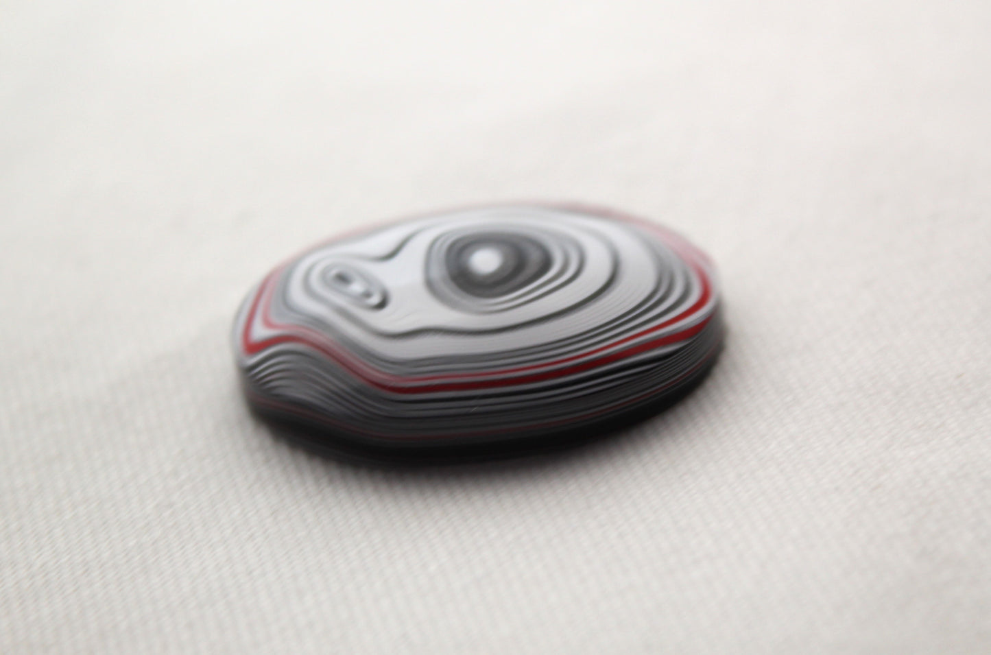 Fordite Cabochon oval white green black