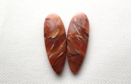 NICE Pair of Petrified Wood Cabochons pink