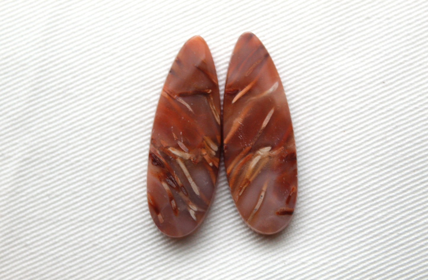 NICE Pair of Petrified Wood Cabochons pink