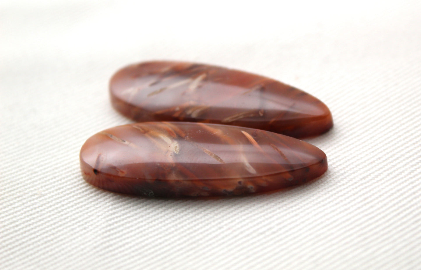 NICE Pair of Petrified Wood Cabochons pink