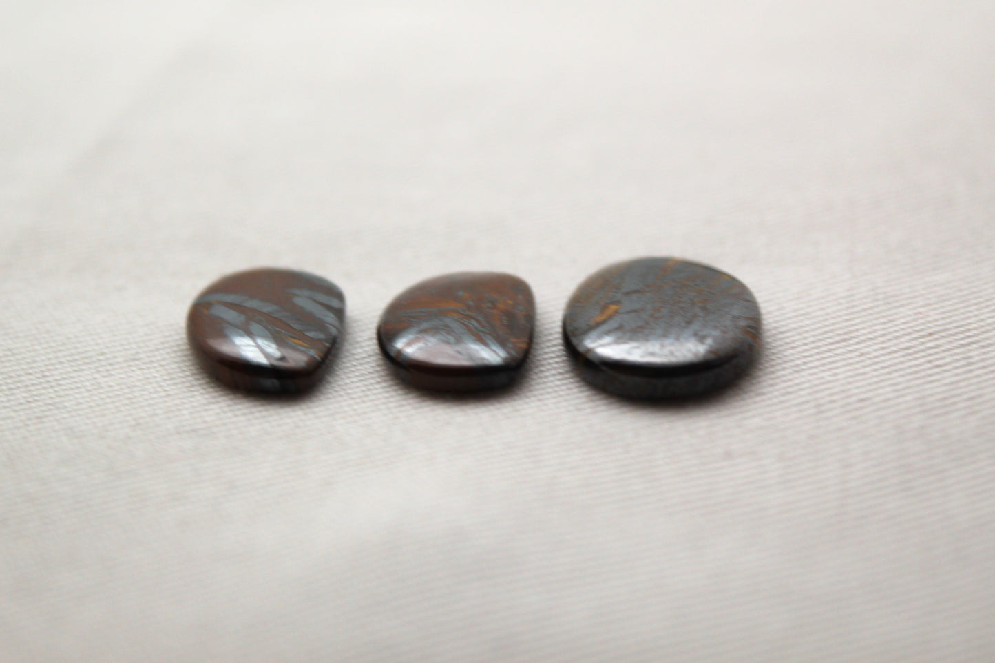 Lot of three THIN cabochons of Hematite Tiger Eye freeform