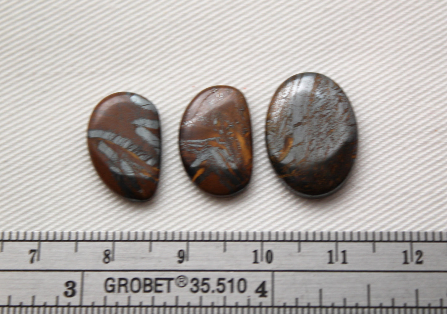 Lot of three THIN cabochons of Hematite Tiger Eye freeform