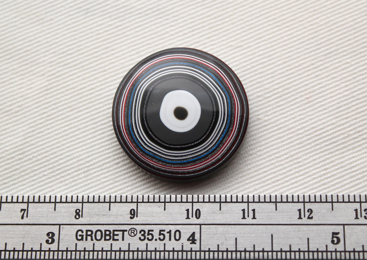 Fordite Cabochon round red grey white 25MM