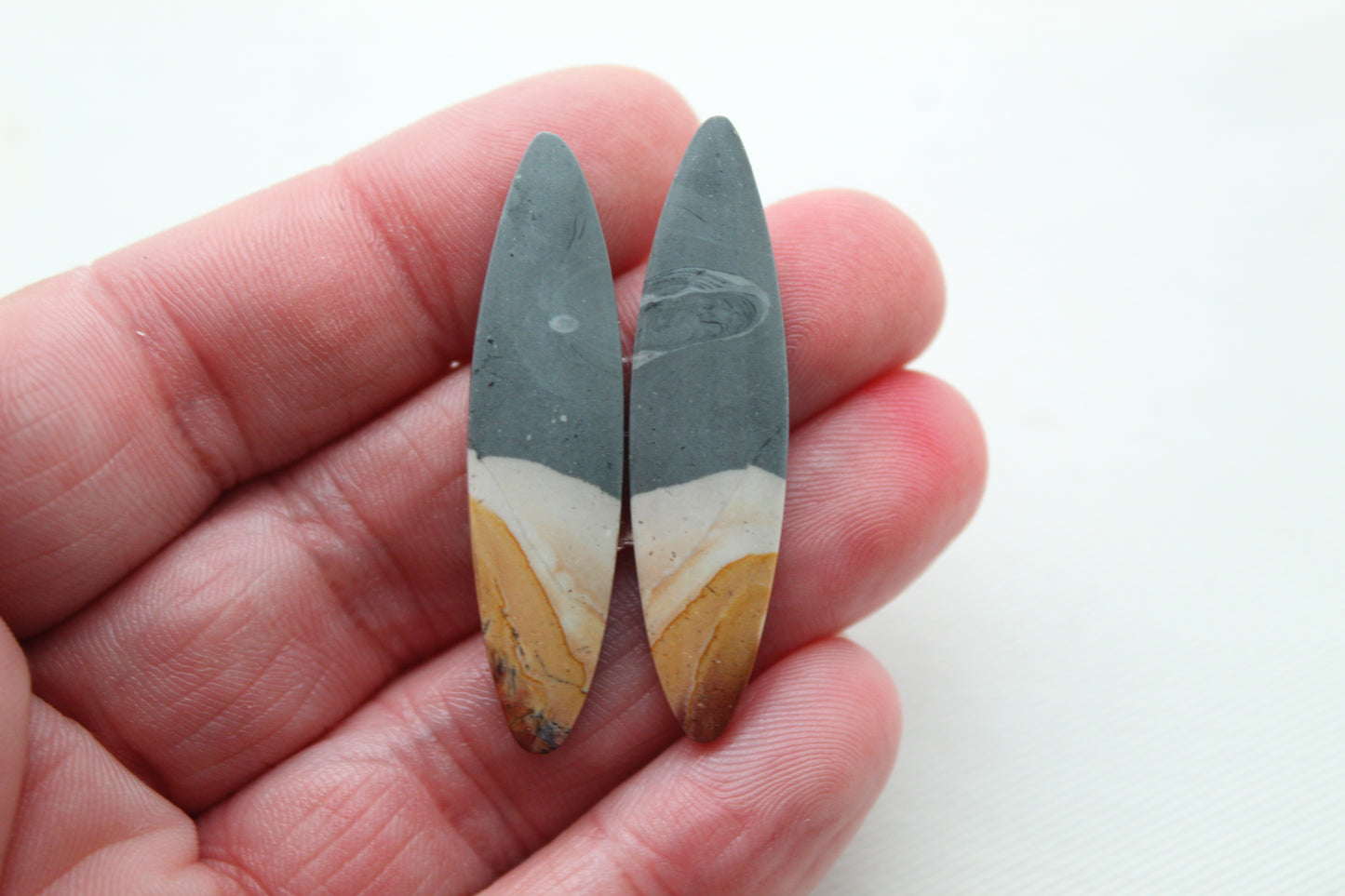 Matching pair of Indonesian Polychrome Jasper Cabochons Oval