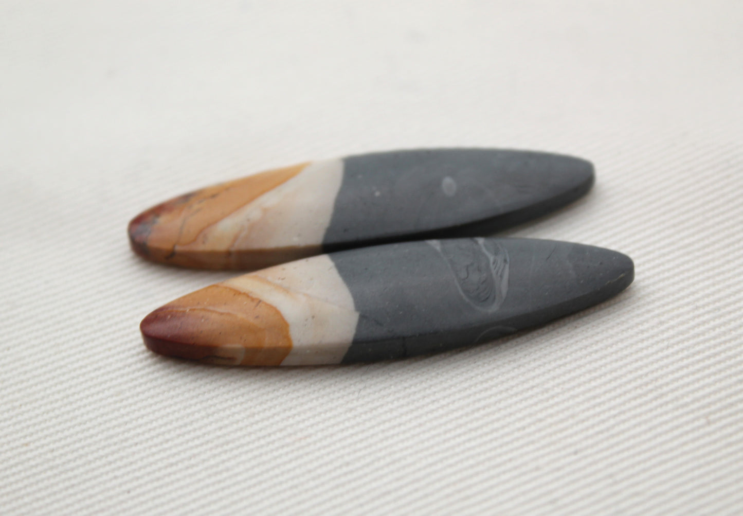 Matching pair of Indonesian Polychrome Jasper Cabochons Oval