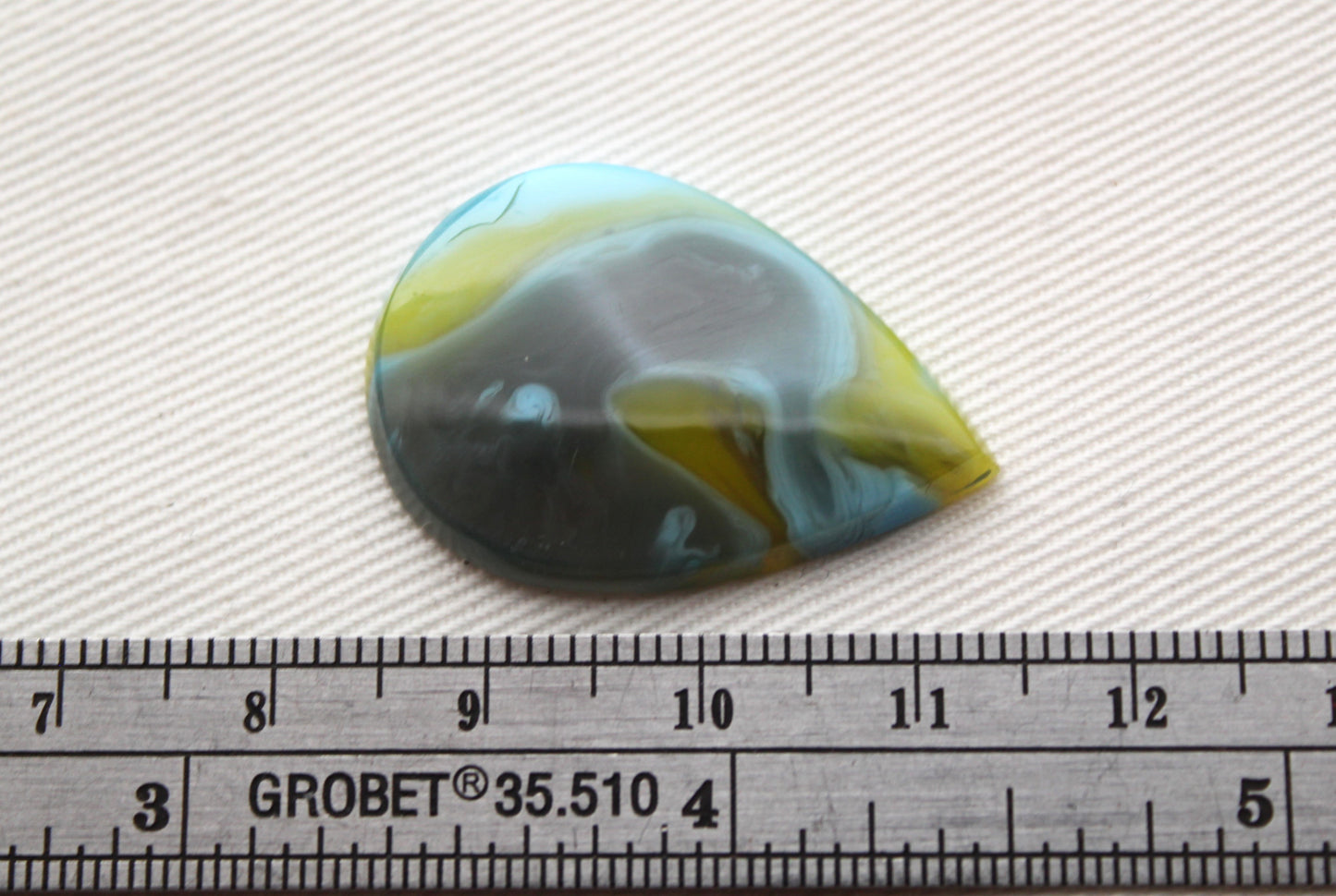 One Resin Cabochon teardrop blue yellow