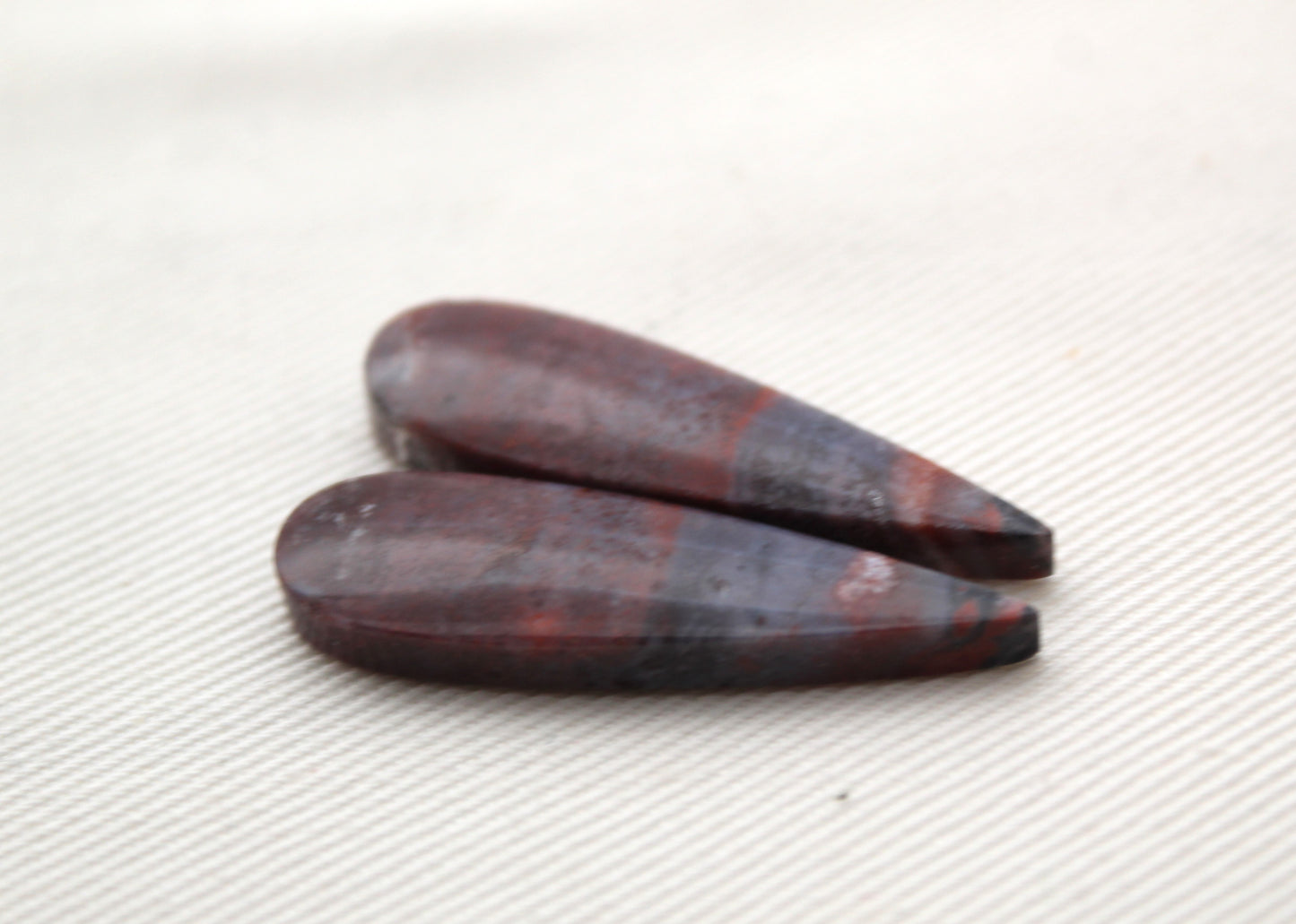 Small pair of Petrified Wood Cisero Cabochons purple