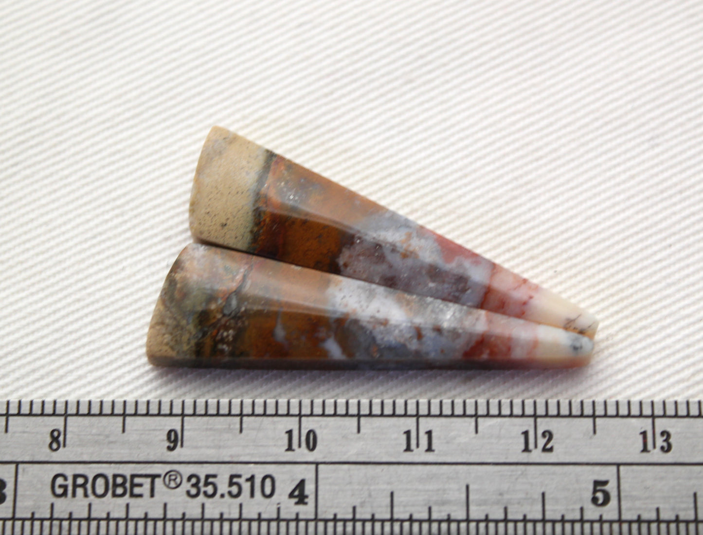 Nice pair of Opalized Copper Wood Cabochons