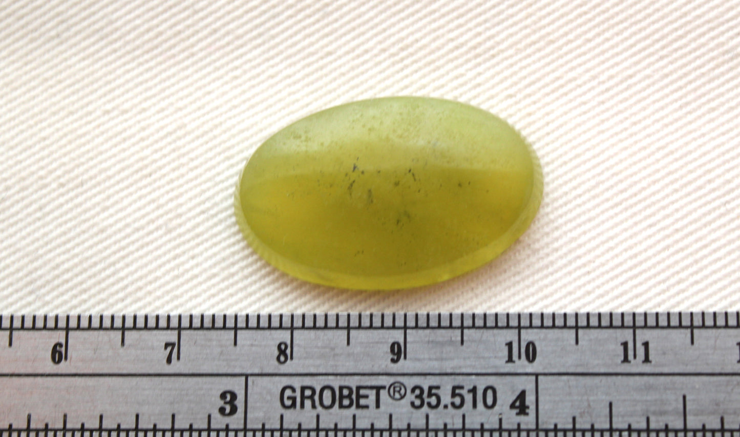 One Vesuvianite Cabochon Gemstone light green Oval