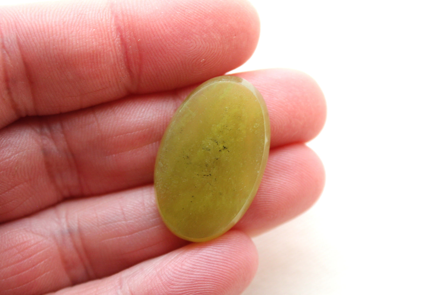 One Vesuvianite Cabochon Gemstone light green Oval