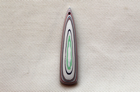 Long DRILLED piece of Fordite white red green