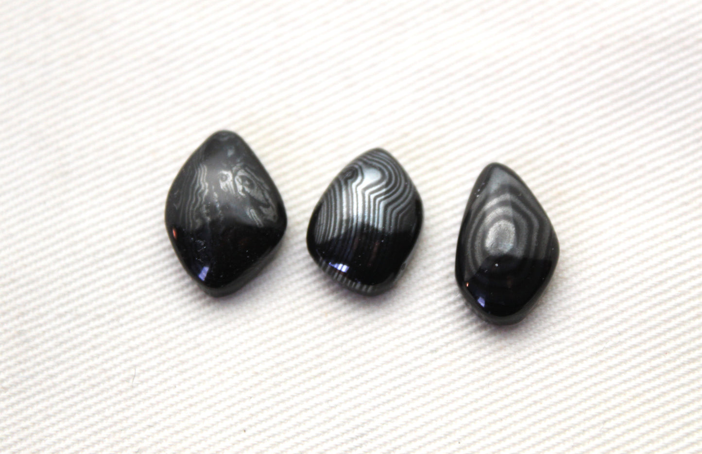 THREE small Psilomelane freeform Cabochons