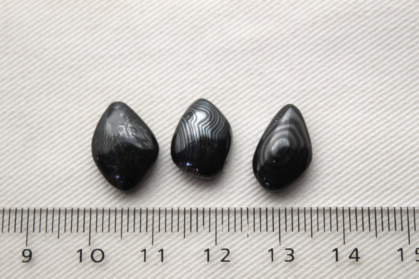 THREE small Psilomelane freeform Cabochons