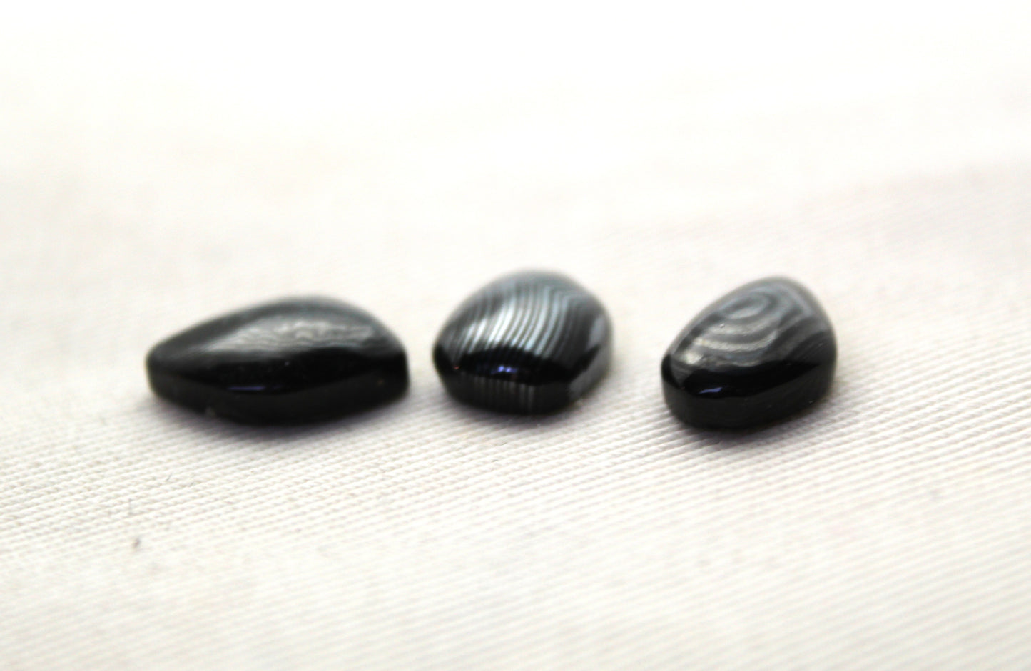 THREE small Psilomelane freeform Cabochons