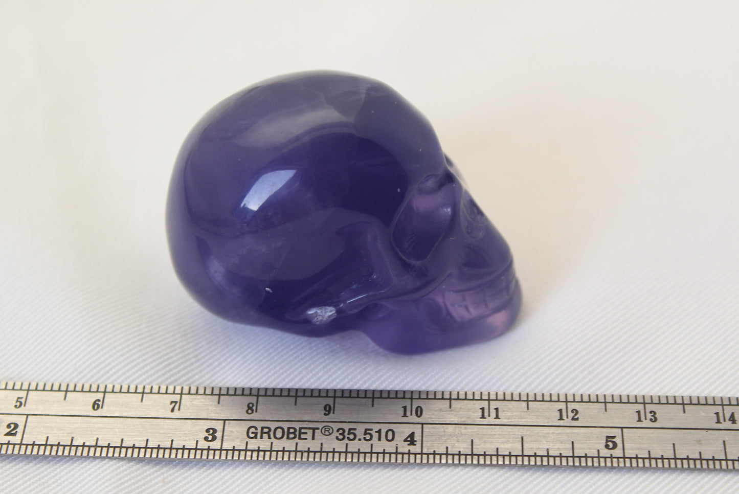 One Fluorite SKULL natural Gemstone Purple