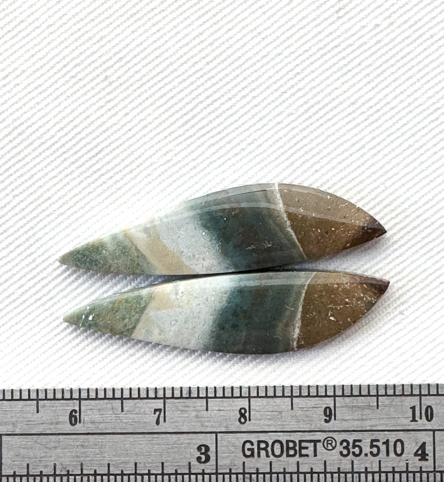Matching pair of green Jasper Cabochons freeform