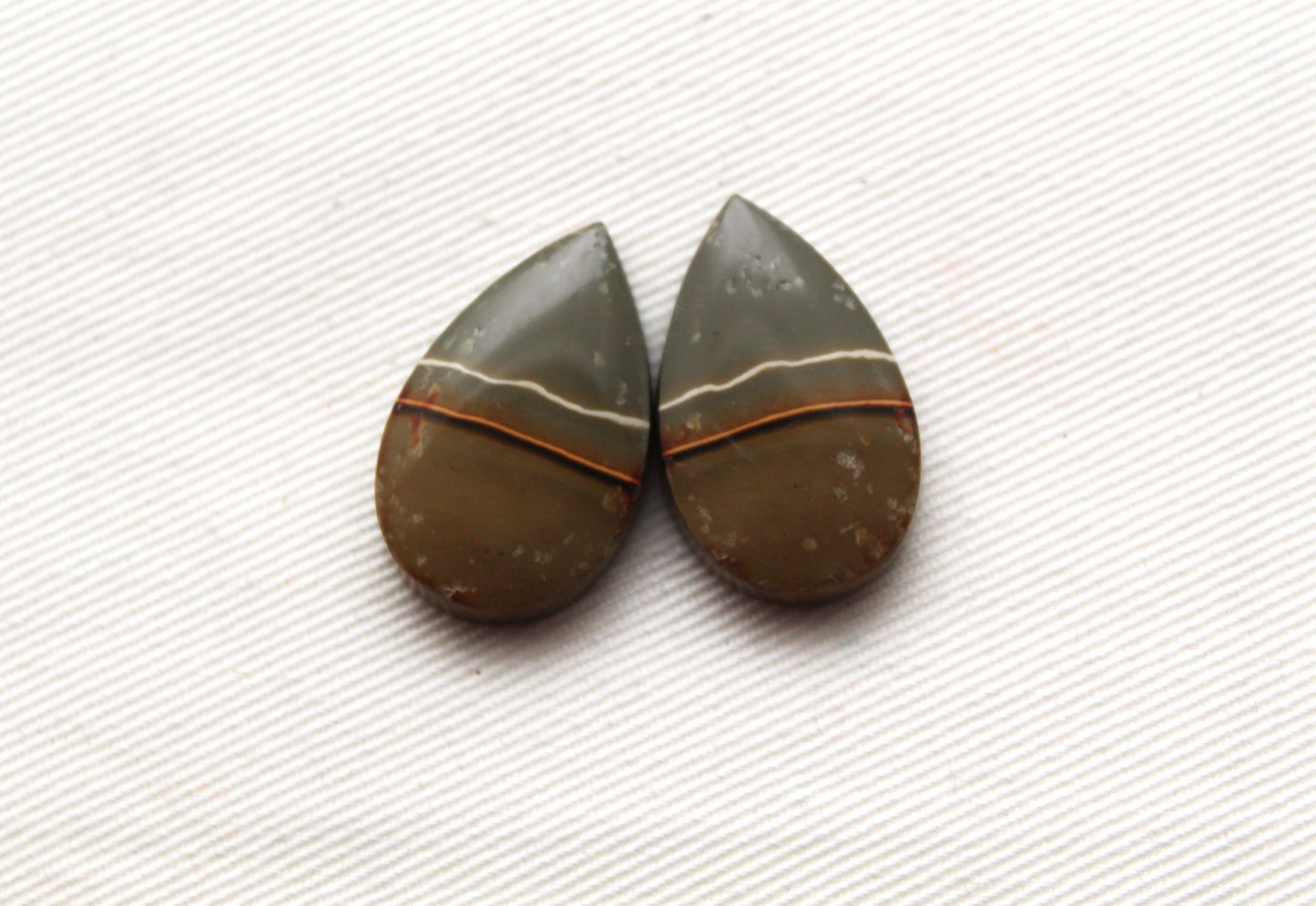 Matching pair of polychrome Jasper Cabochons green