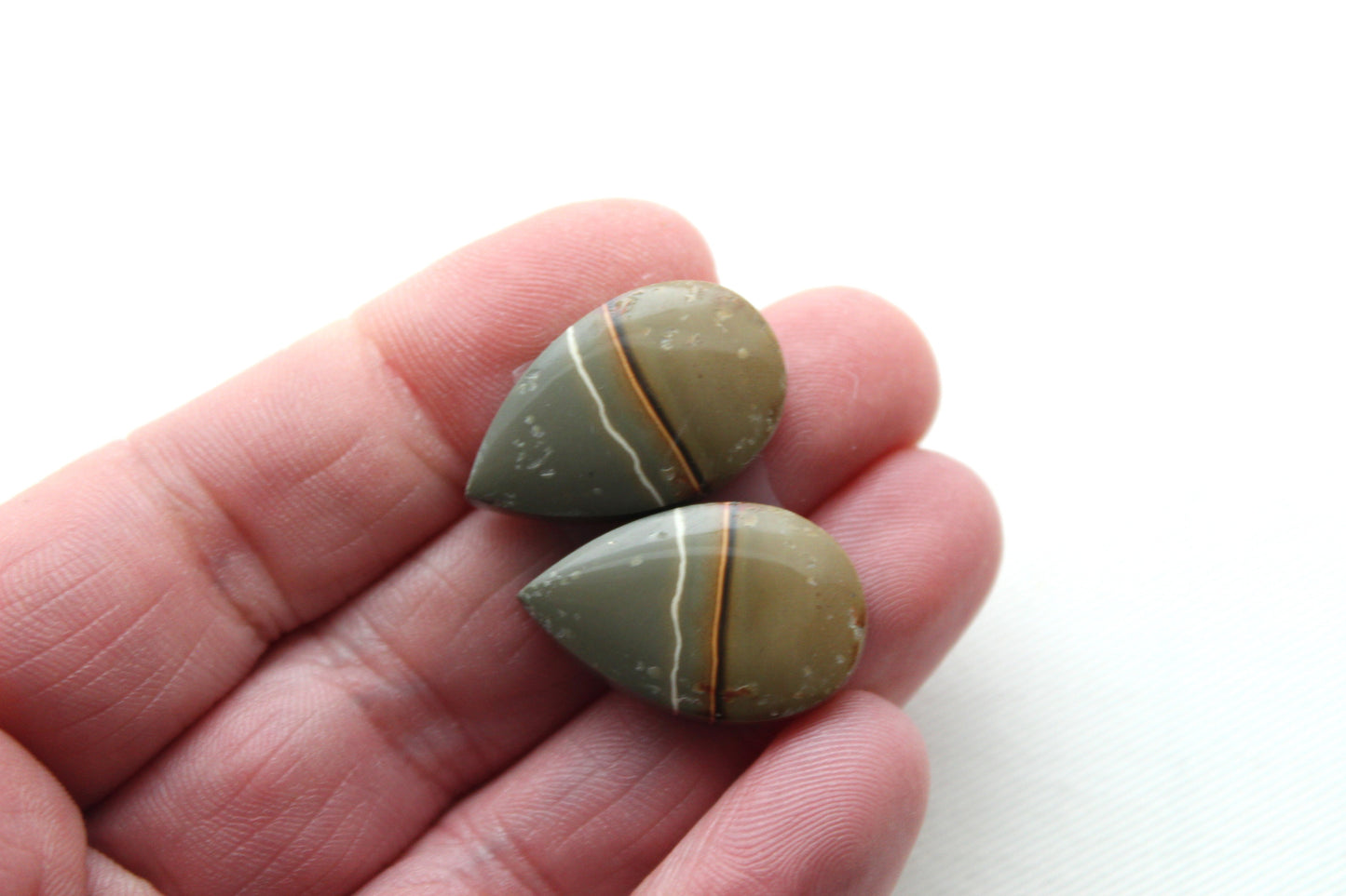 Matching pair of polychrome Jasper Cabochons green