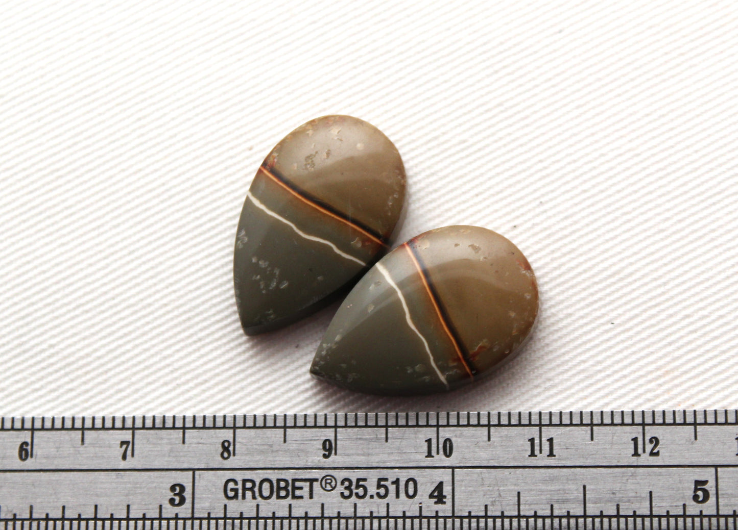 Matching pair of polychrome Jasper Cabochons green