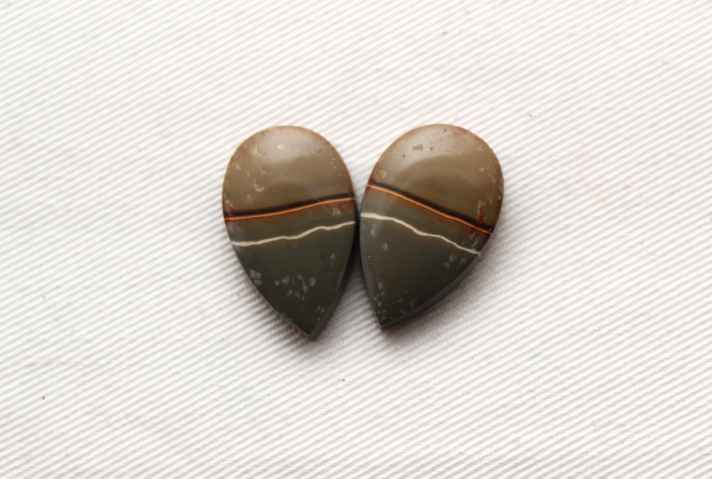 Matching pair of polychrome Jasper Cabochons green