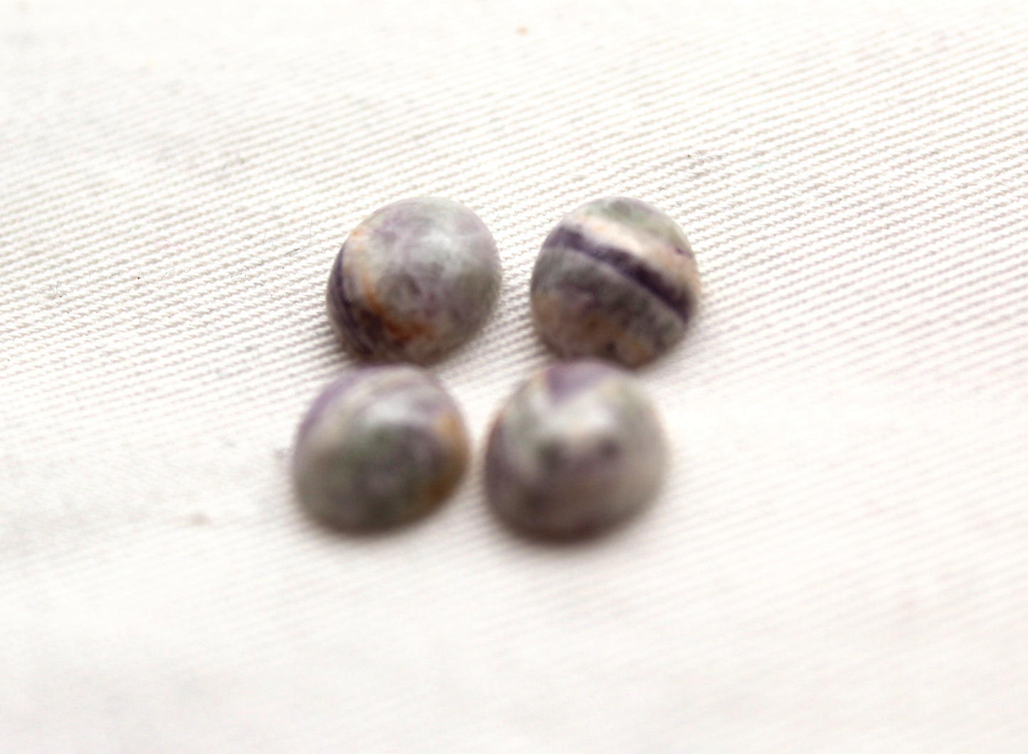 FOUR amethyst Chevron oval cabochons 9X11MM