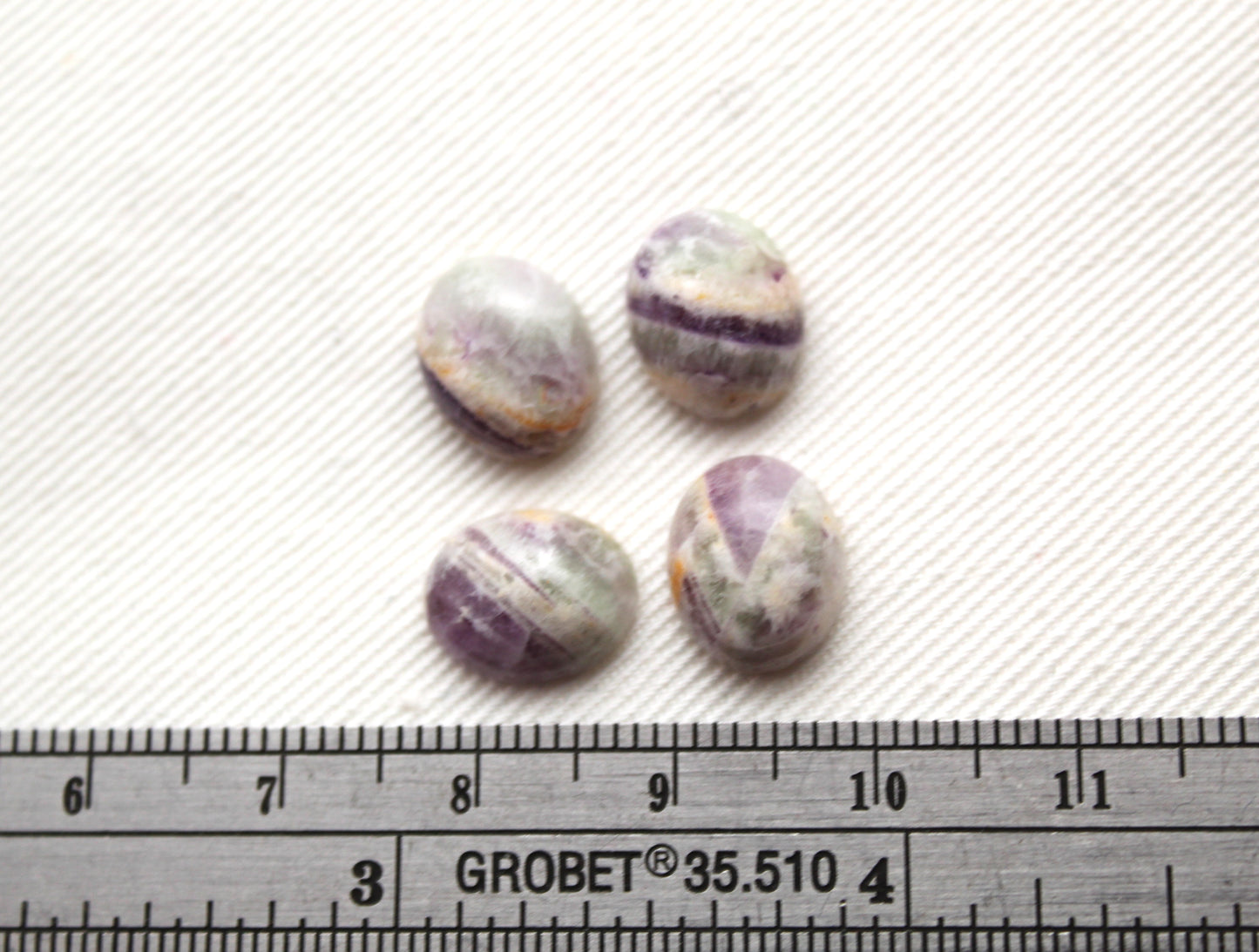 FOUR amethyst Chevron oval cabochons 9X11MM