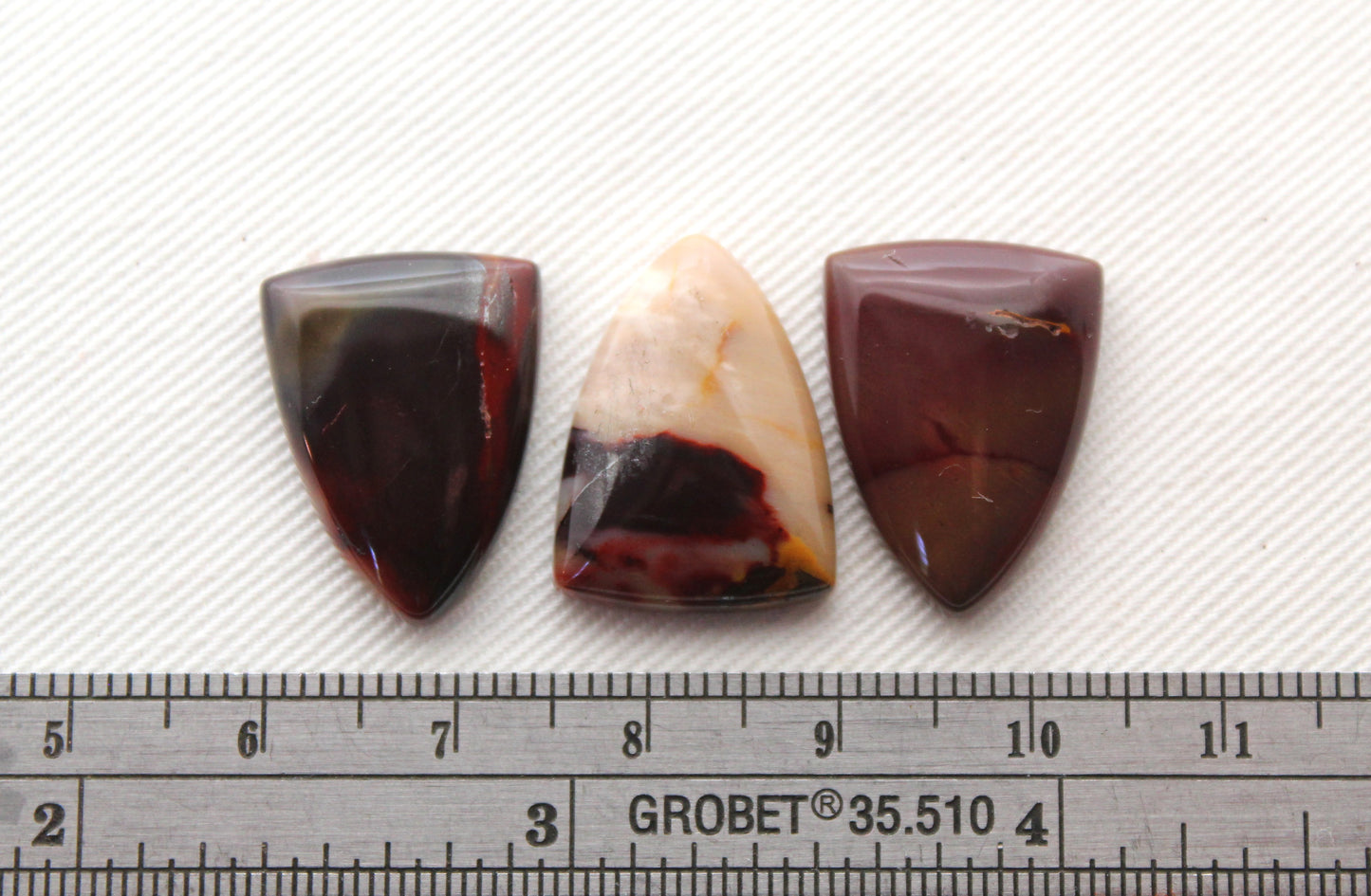 THREE dark mookaite cabochons 15 x 20 MM Gemstones shield