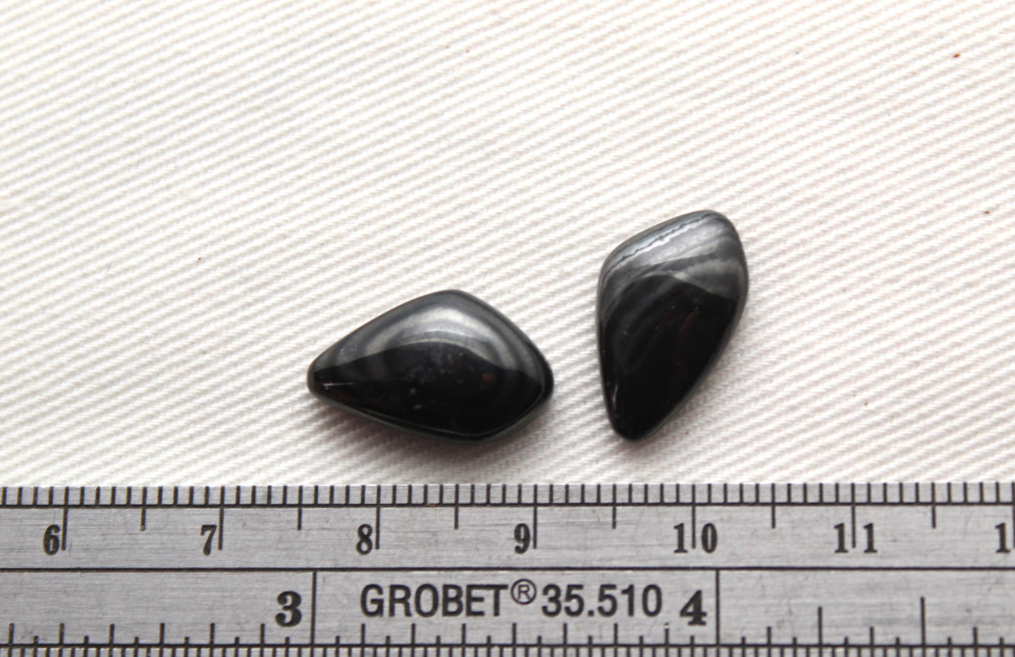 TWO small Psilomelane freeform Cabochons