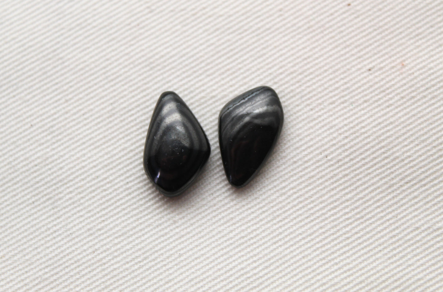 TWO small Psilomelane freeform Cabochons