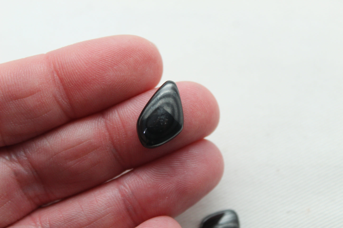 TWO small Psilomelane freeform Cabochons