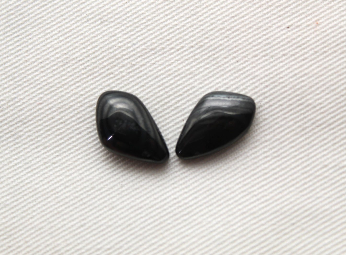 TWO small Psilomelane freeform Cabochons