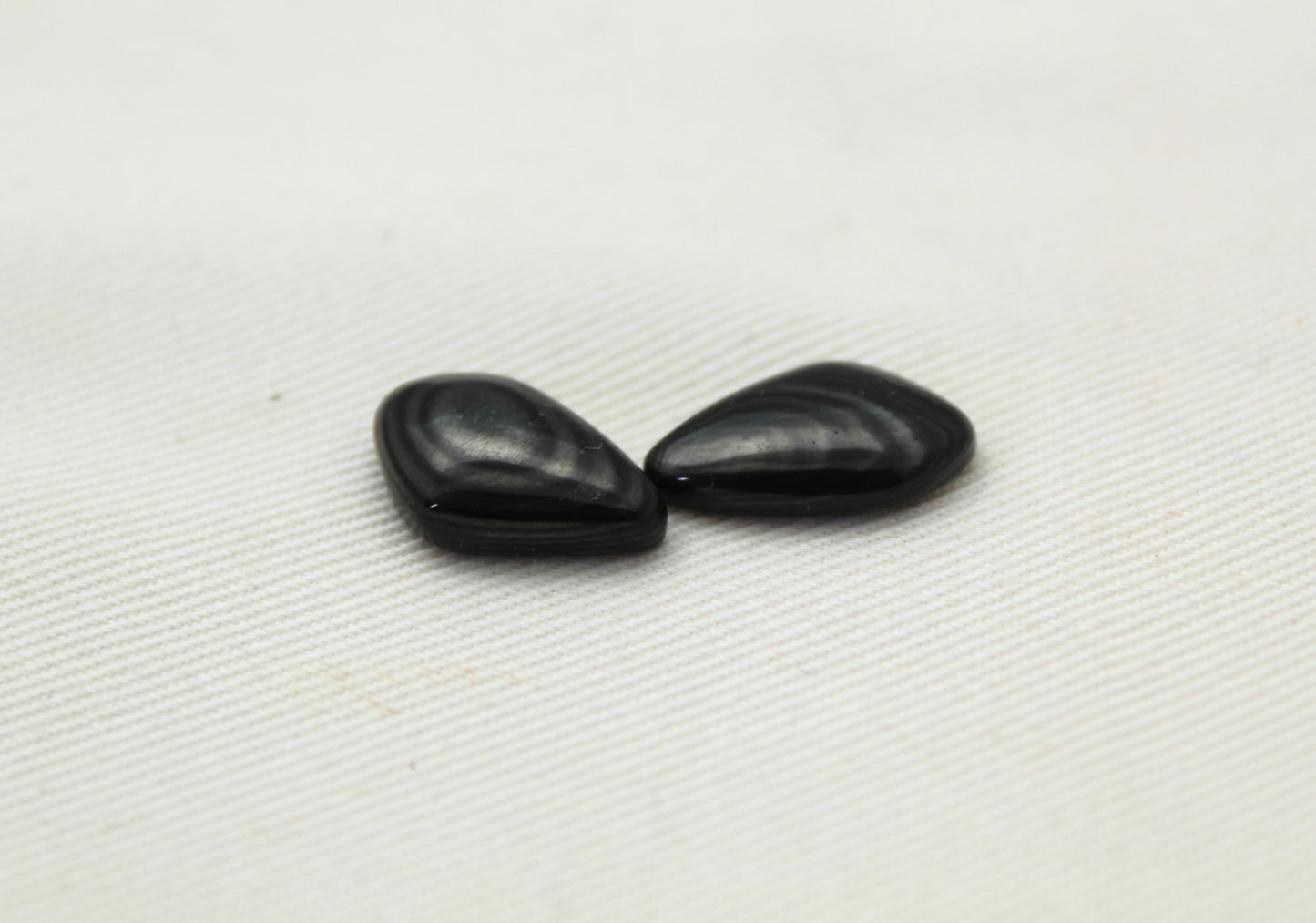 TWO small Psilomelane freeform Cabochons